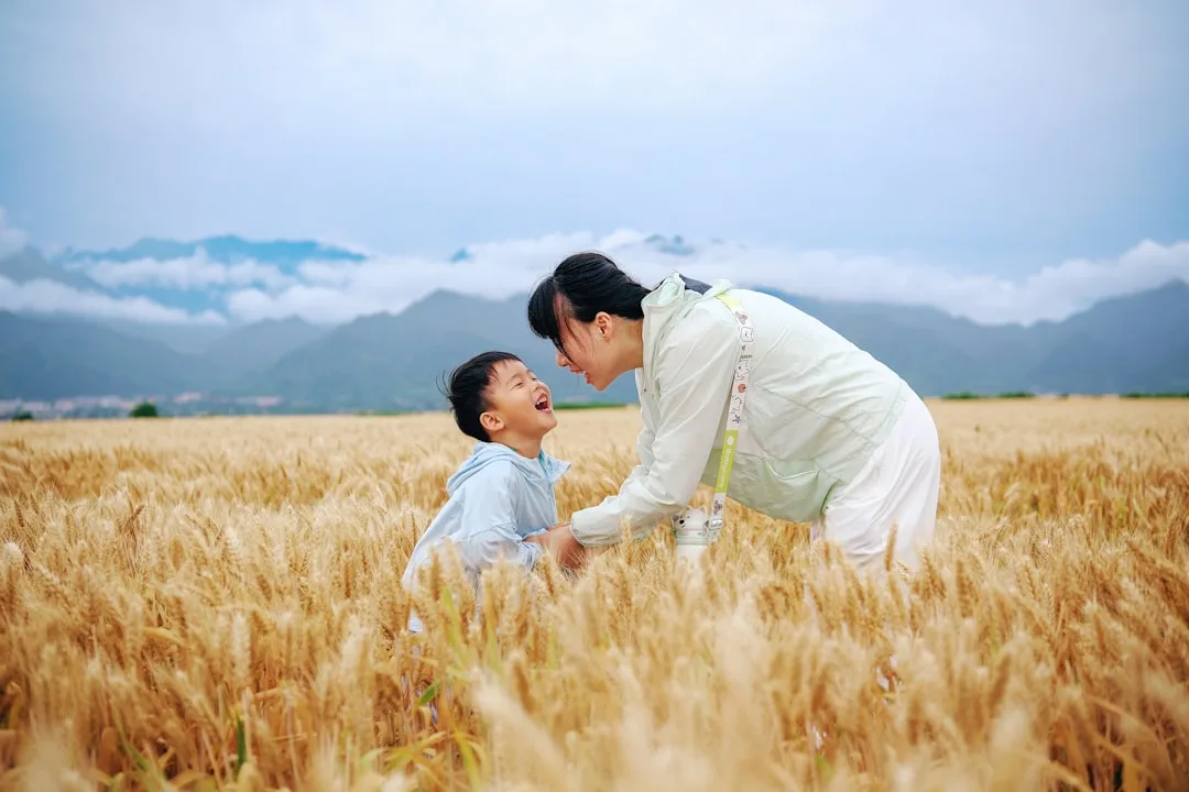parent child playing together outdoor — Parenting & Family perspective 1