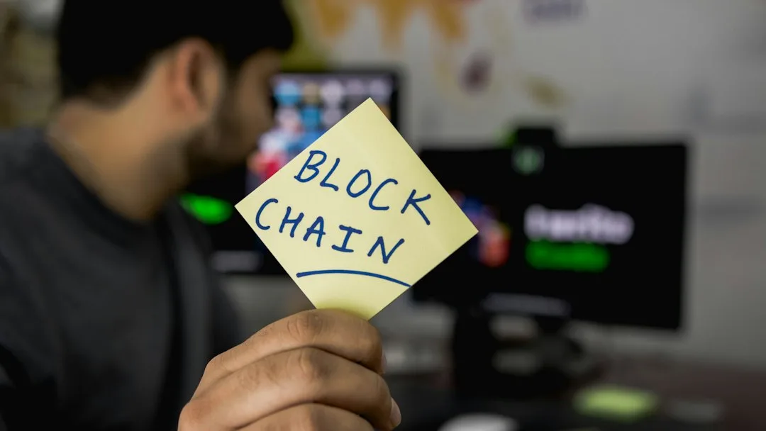 Person wearing decentralized identity wearable with biometric security display