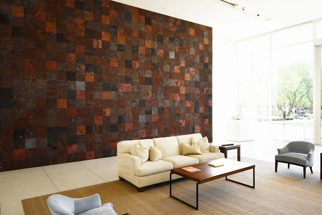 Cork wall panels in neutral bedroom creating soft acoustic backdrop