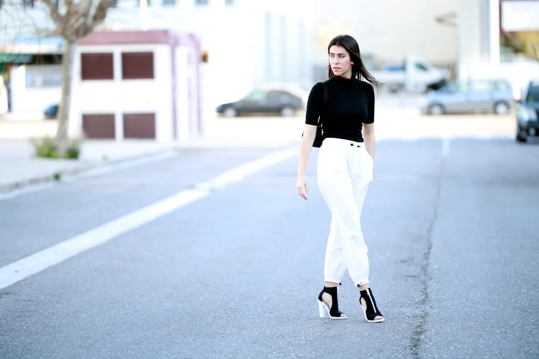 Full body monochrome outfit in shades of beige and cream with varied fabric weights