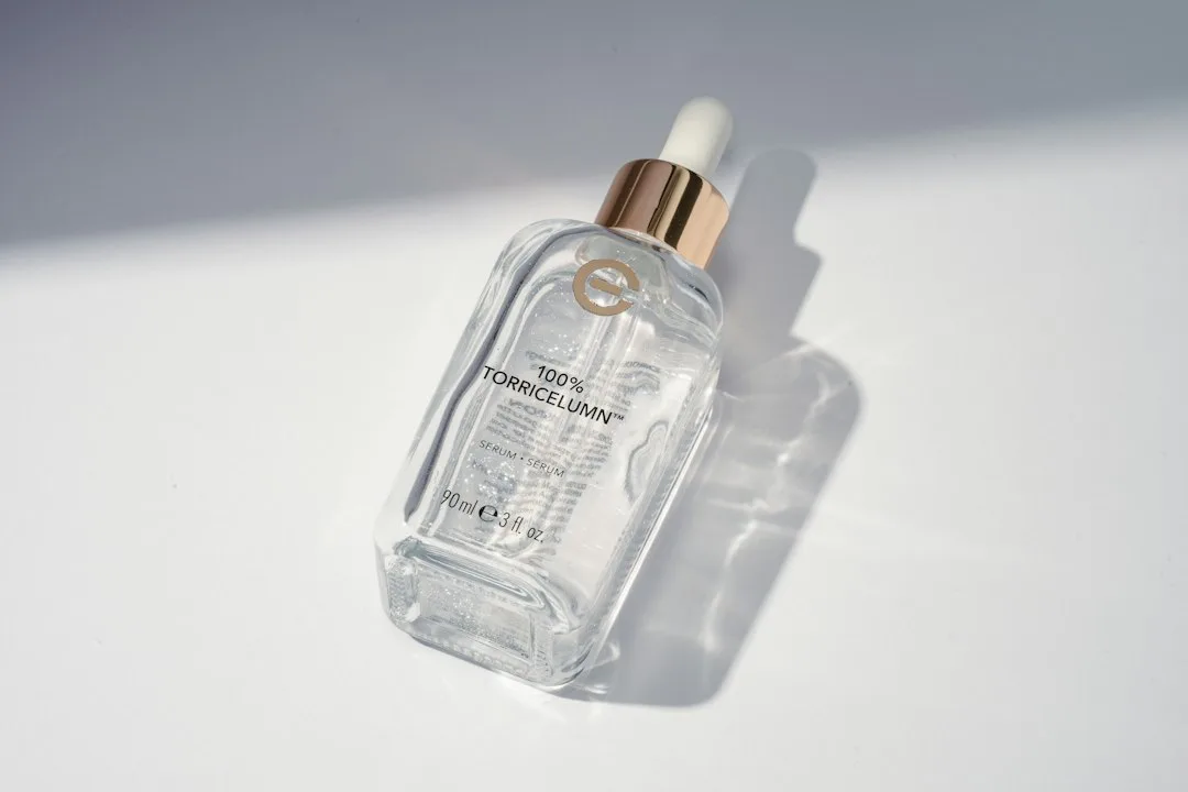 Collagen peptide drink with glass skin results and supplement bottle