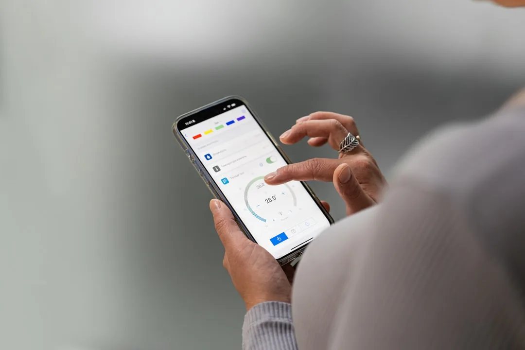 Person using hand gestures to control smart home lighting and climate