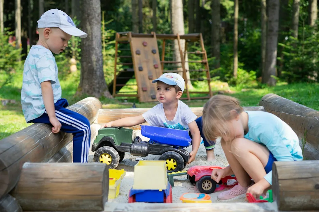 Two children engaging with parent attention individually sibling jealousy