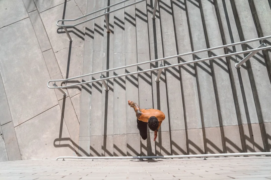 close-up of leg muscles engaged during stair climbing repetition