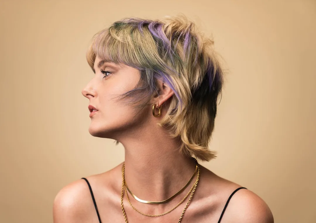 Textured pixie bob hybrid haircut showcasing layered movement and soft framing