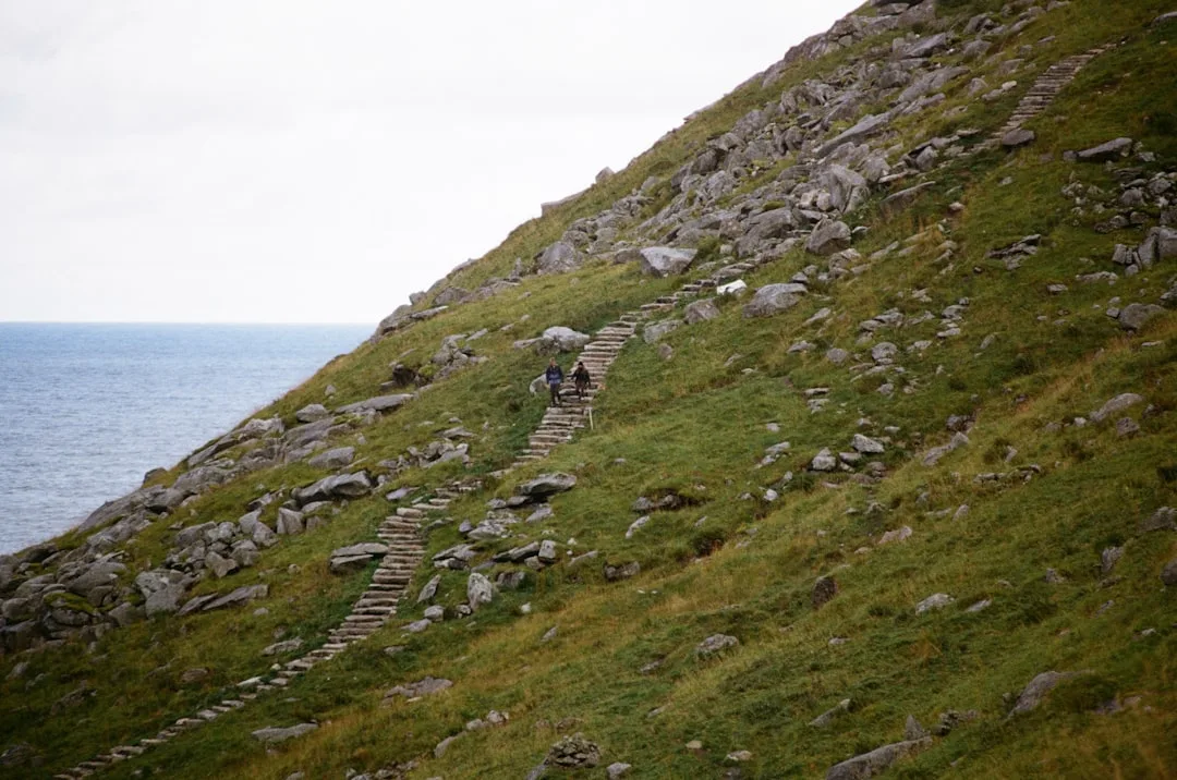 athlete ascending outdoor steps during stair climbing workout training session