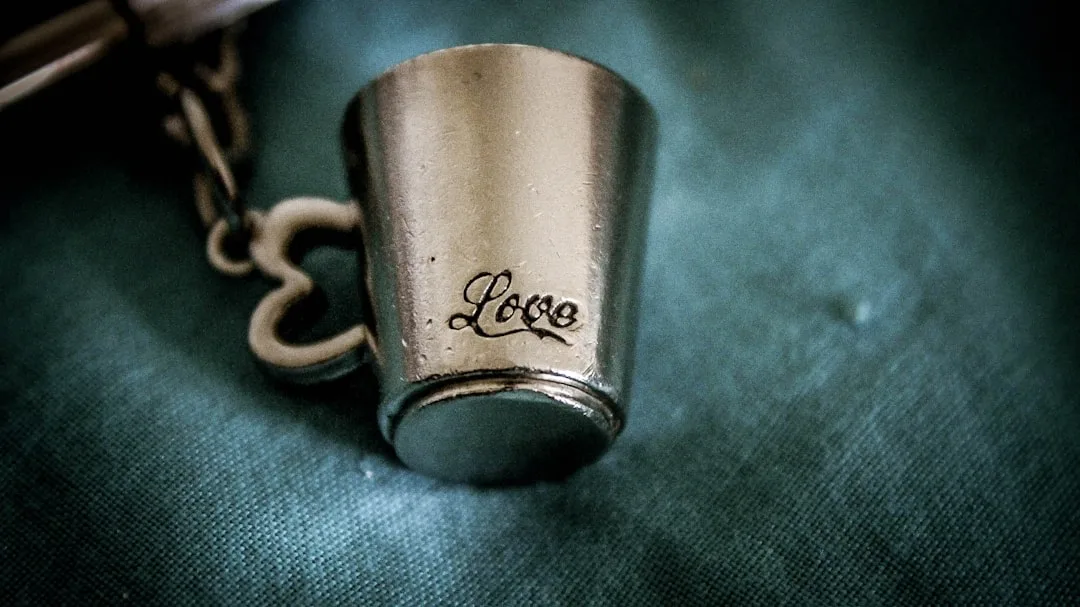 Close-up of engraved wedding favors showing custom couple names and wedding date
