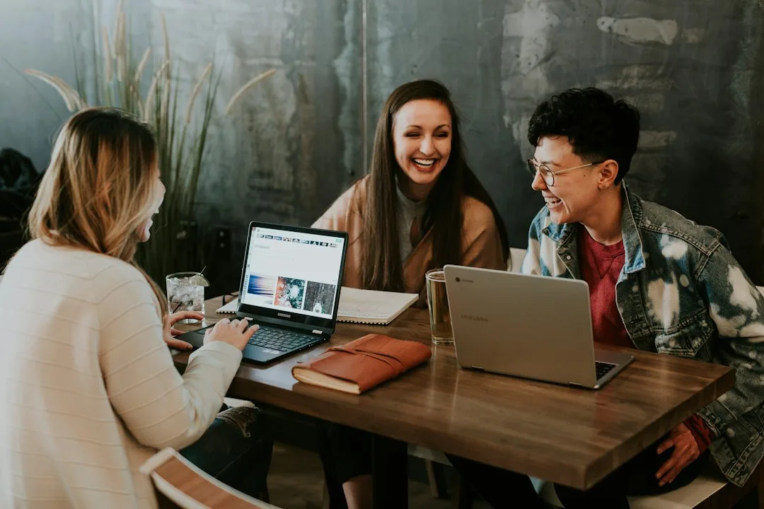 diverse adults working on asynchronous learning with peer accountability structure