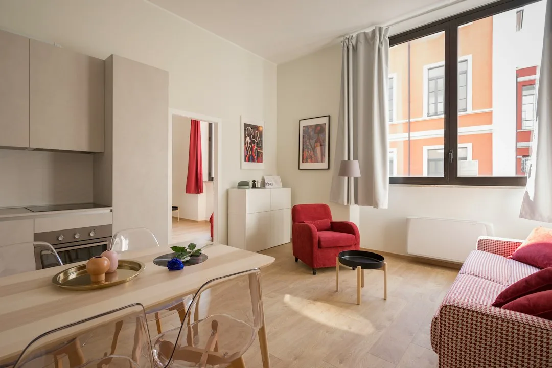 Bright co-living spaces with shared kitchen and lounge seating