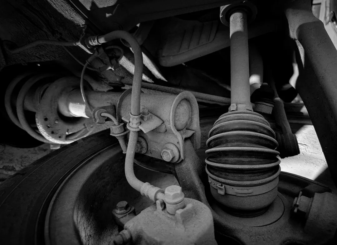 close-up of undercarriage rust formation on vehicle frame components