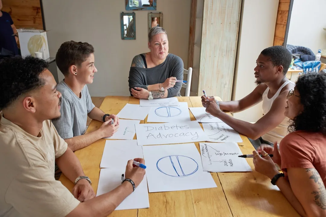 Diverse group of adults in video call accountability session learning community