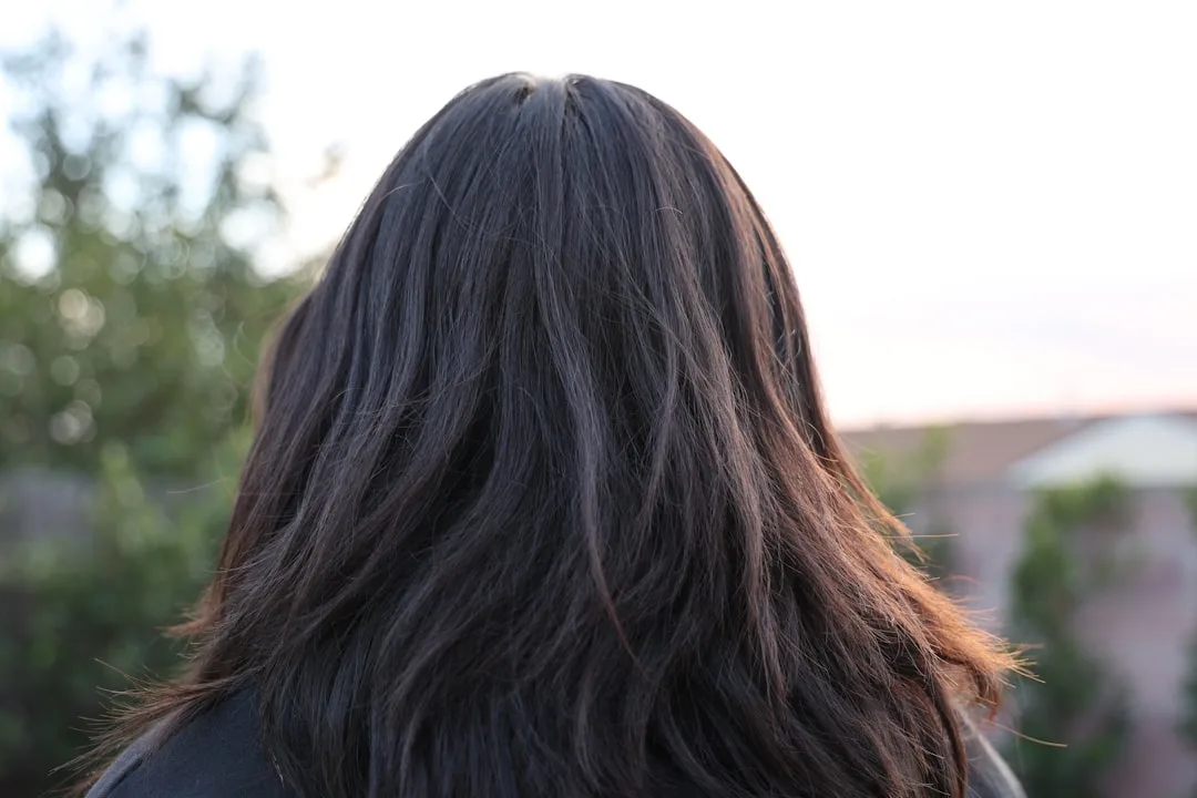 Back view of butterfly layers hairstyle demonstrating depth and textured layering
