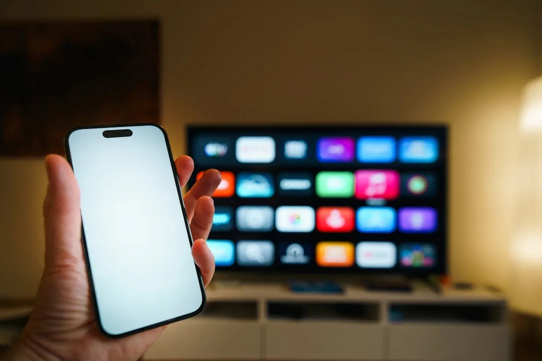 Close-up of hand gesture recognition sensor detecting arm movements in living room