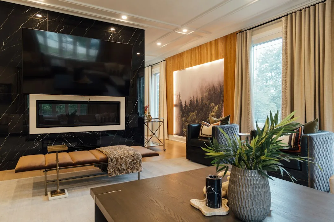 Modern bedroom with luminous Venetian plaster feature wall behind bed frame
