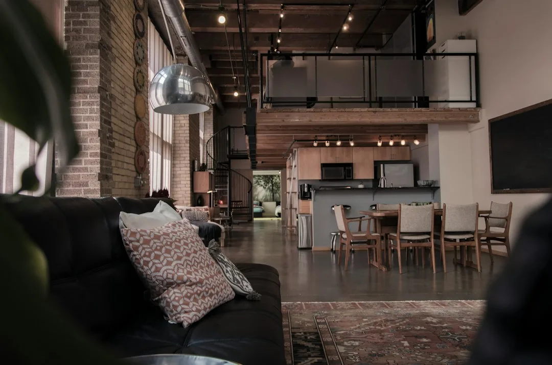 Modern loft interior in adaptive reuse real estate historic warehouse renovation
