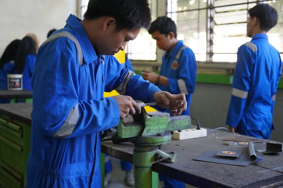 Student completing hands-on vocational certification welding project