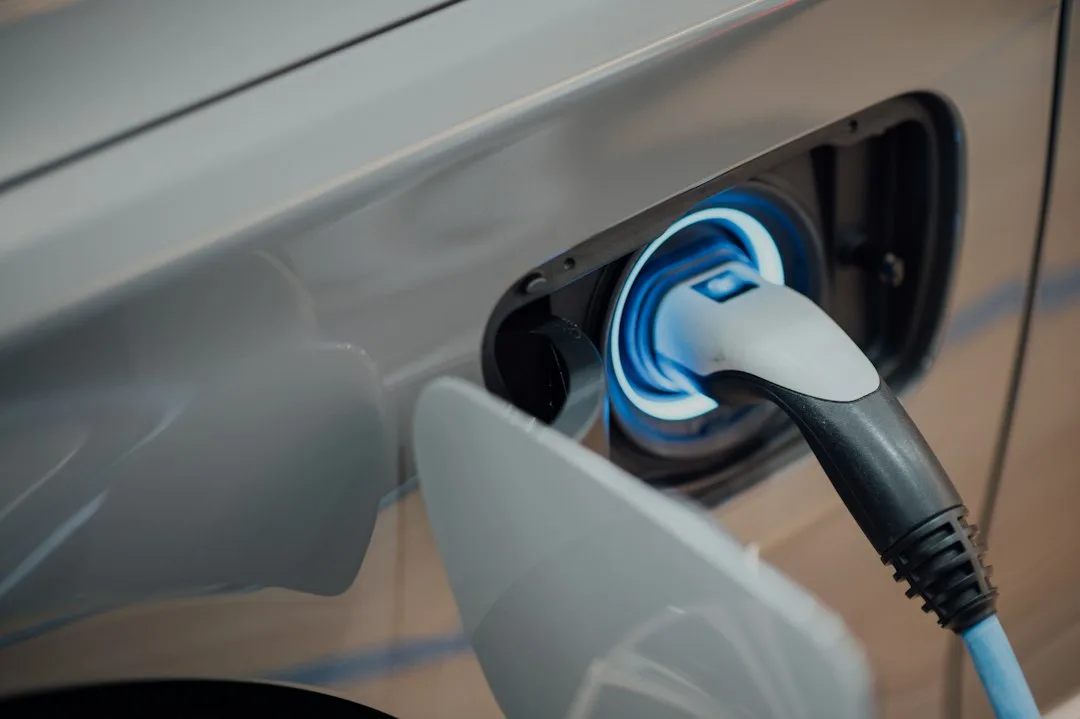 Modern EV battery management system display showing thermal and charge monitoring