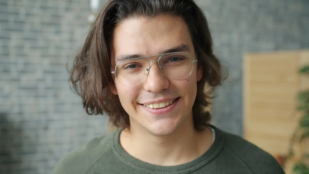 person wearing transparent smart glasses indoors — Tech & Future perspective 2
