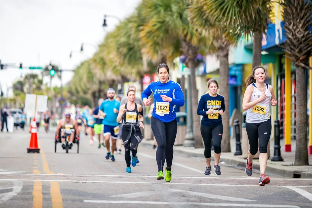 Runners gathering for run club events on a city street