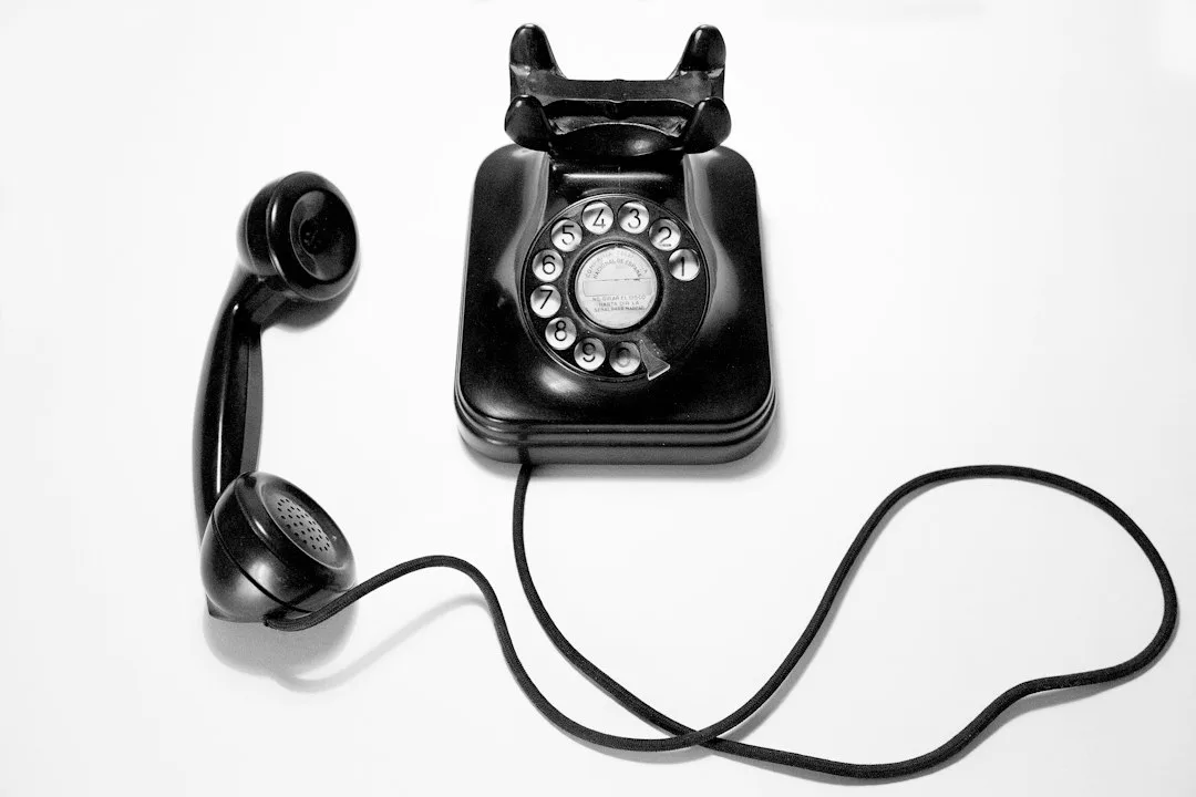 Woman practicing spoken language with voice conversation practice apps on phone