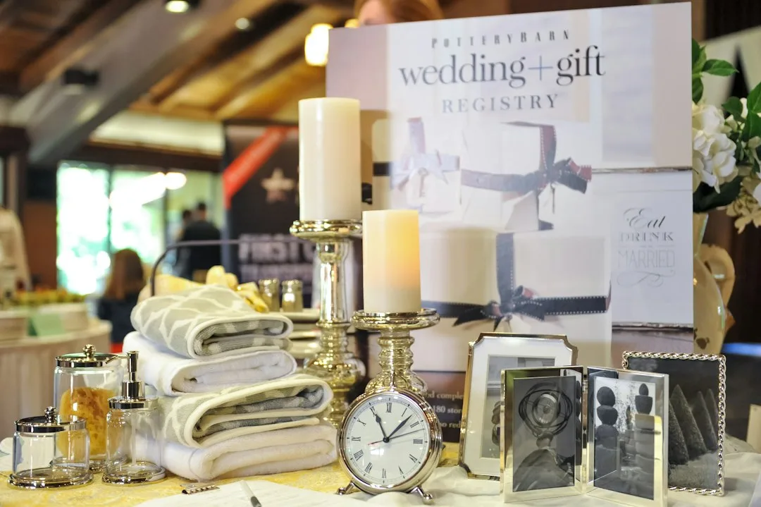 Couple exchanging experiential wedding gift card instead of physical registry item