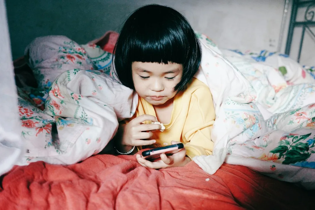 Child reading digital consent agreement on tablet before using app
