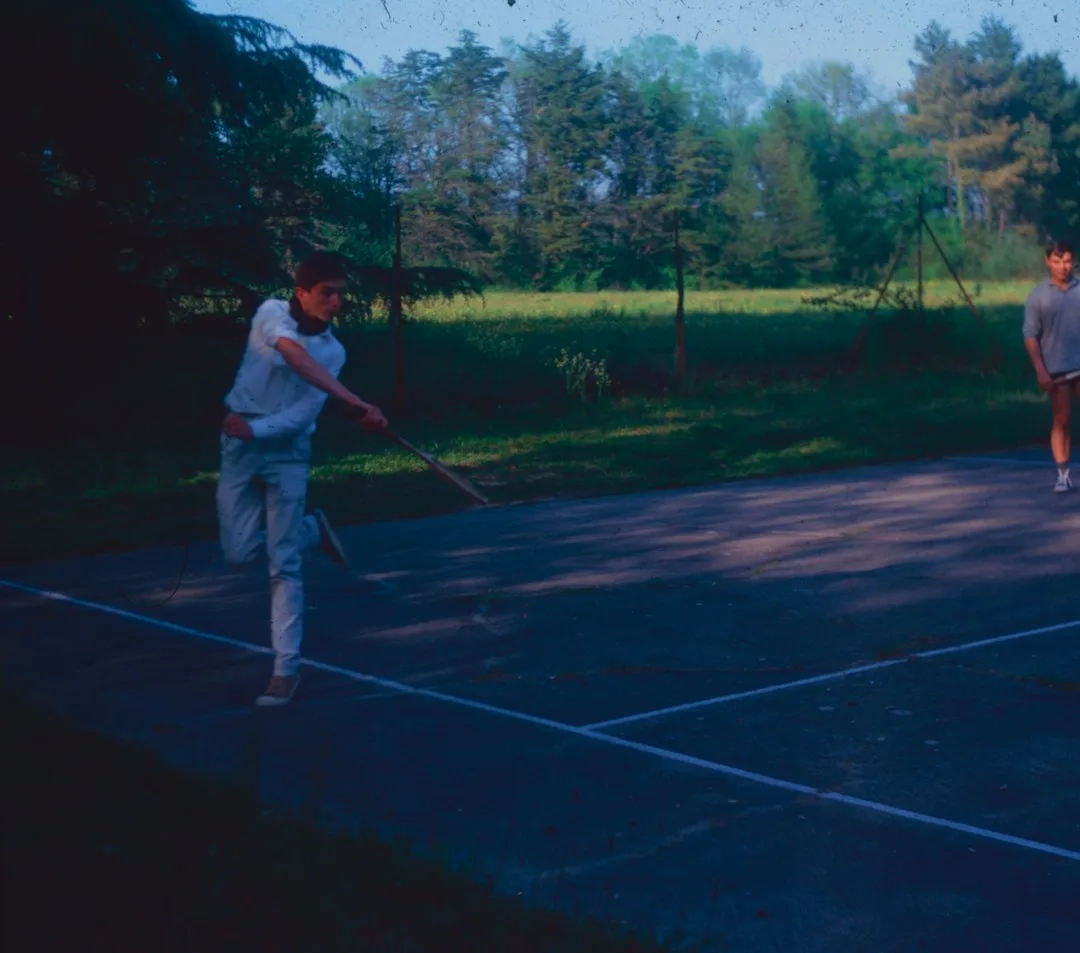 Close view of a lightweight pickleball paddle grip and polymer face