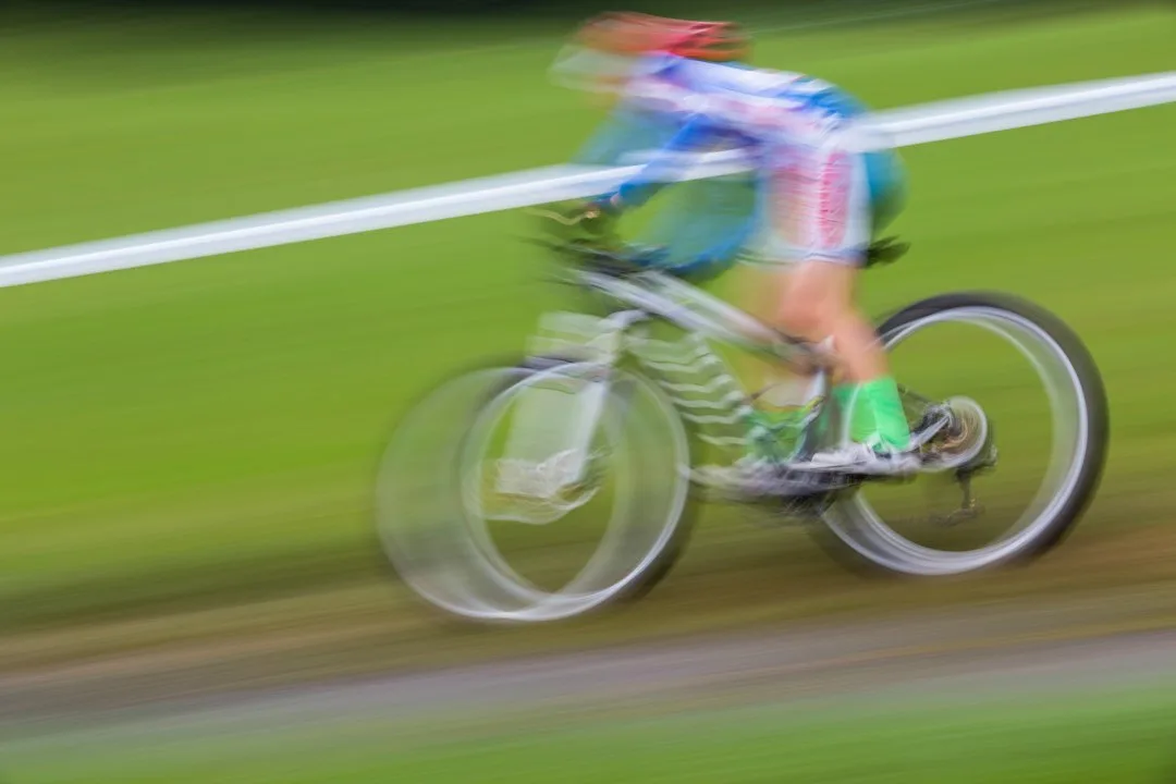 athlete performing controlled eccentric running descent on incline