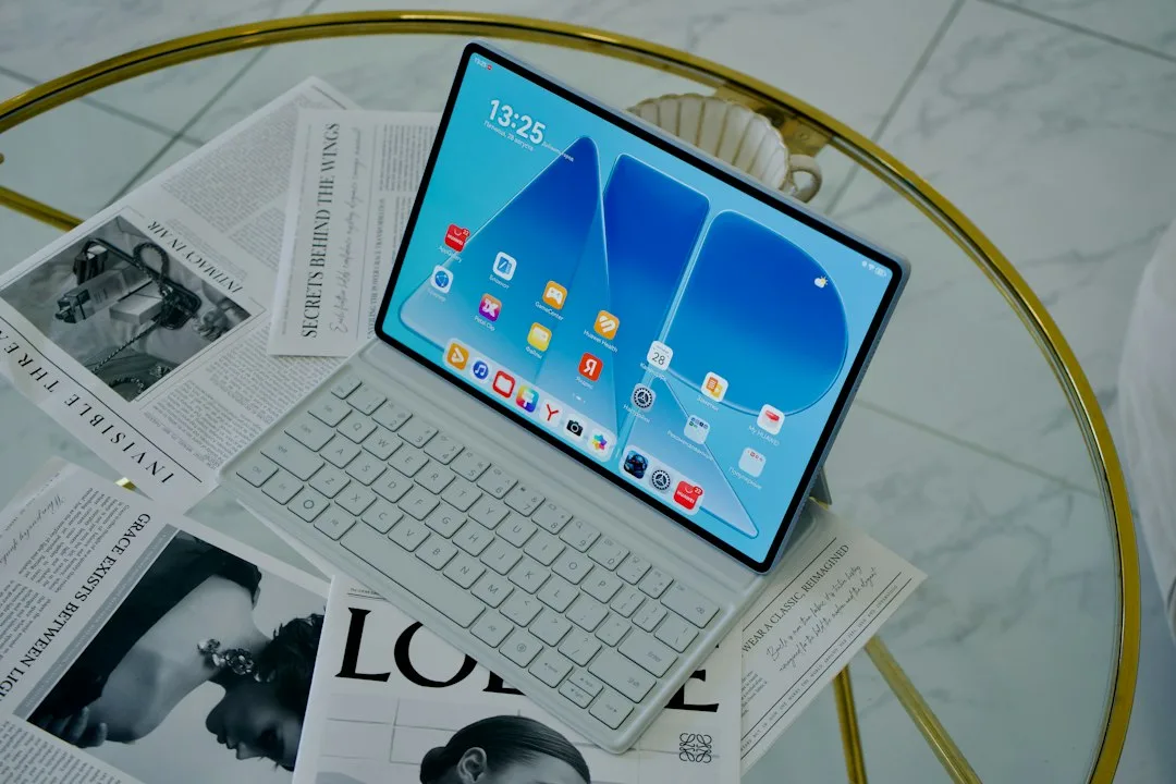 Close view of a foldable phone hinge and crease on a neutral background