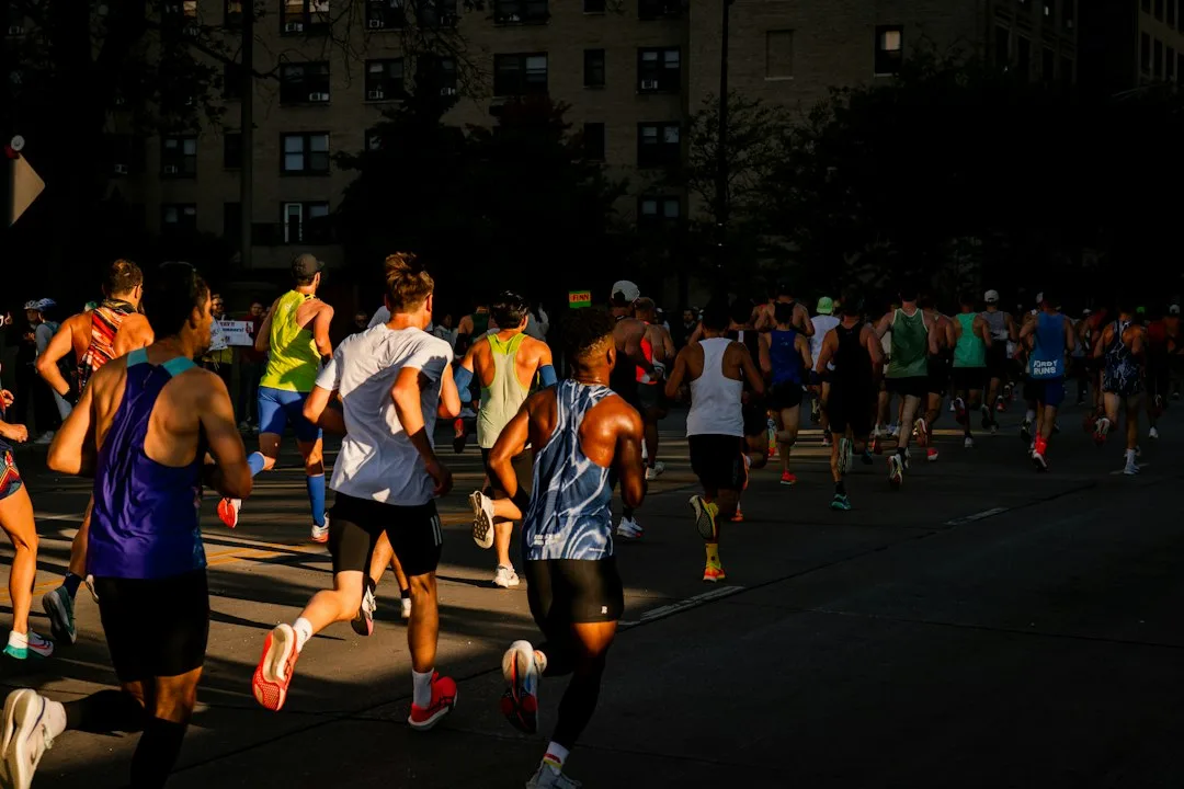 Close view of running shoes lined up at the start of a group run